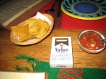 Very small serving of chips and salsa (cigarettes added for scale)
